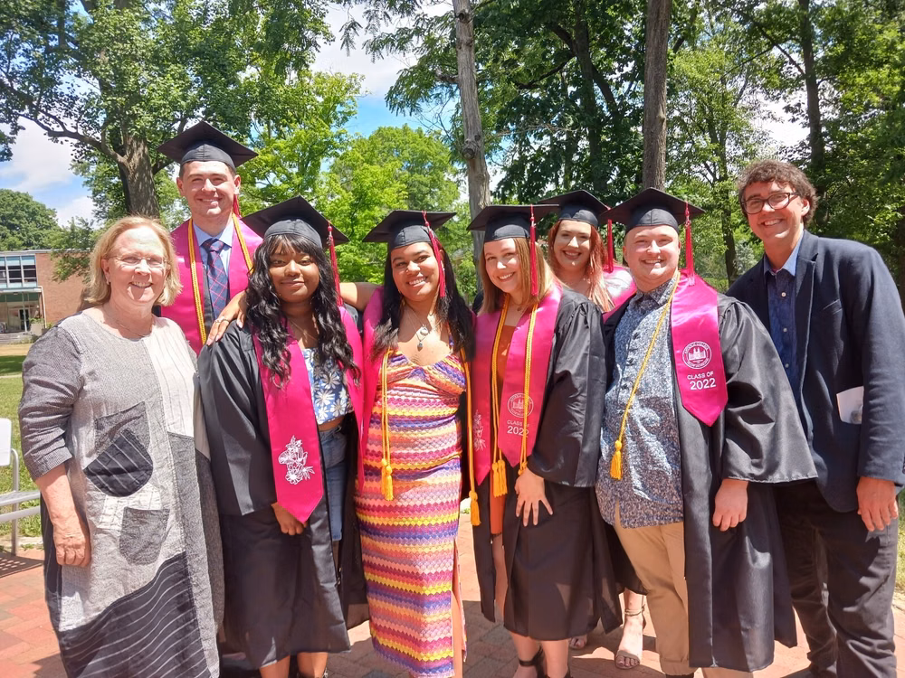 Jane Fernandes, president of Antioch College, with students at commencement.