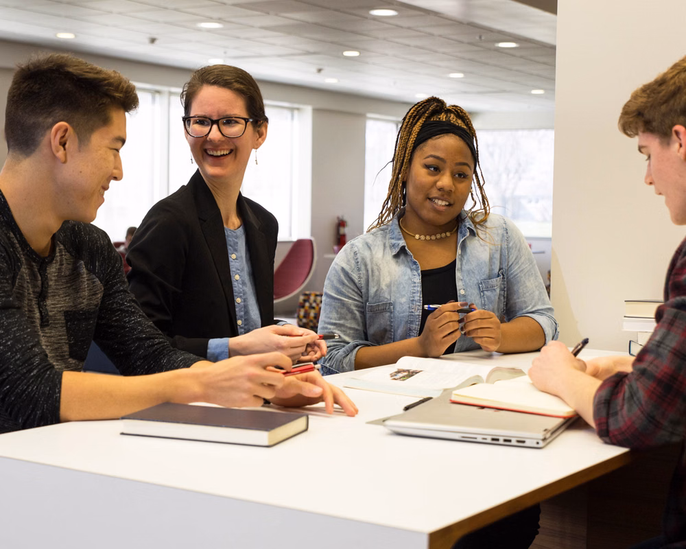 diverse group of students in discussion group