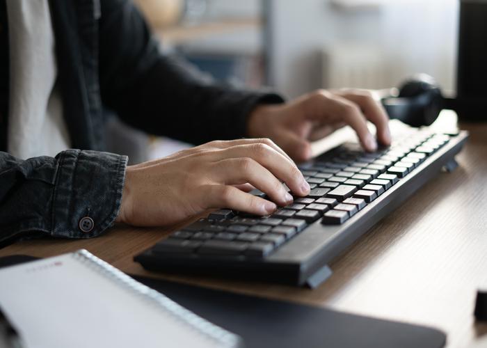 University student using wireless keyboard