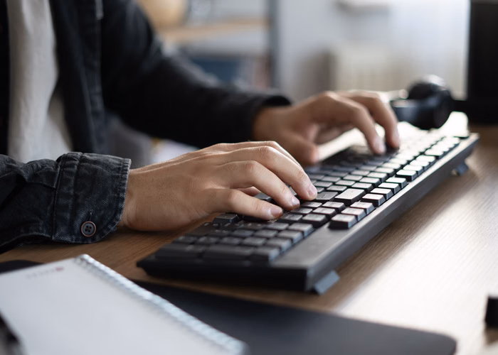 University student using wireless keyboard
